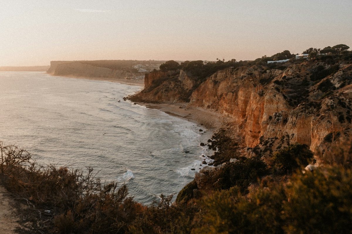 a view of the ocean from a cliff